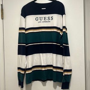 2 guys shirts the GUESS is a S and the HUF is M